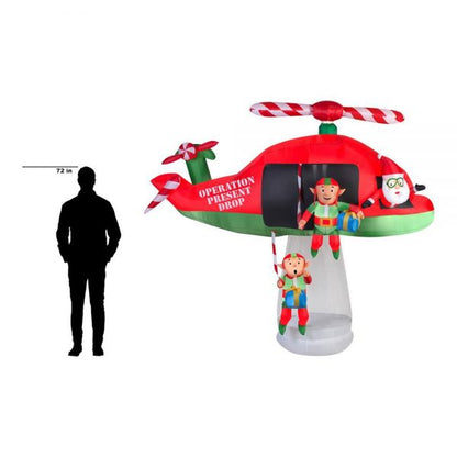 Christmas-animated inflatable santa and elves in an animated helicopter scene